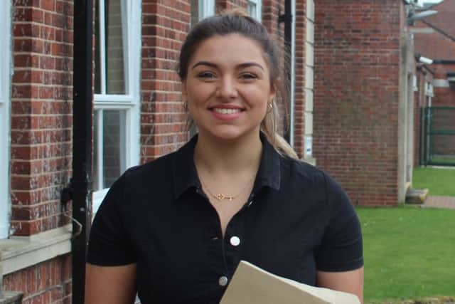 Looking forward to the next stage of her education is this successful student at QEHS.