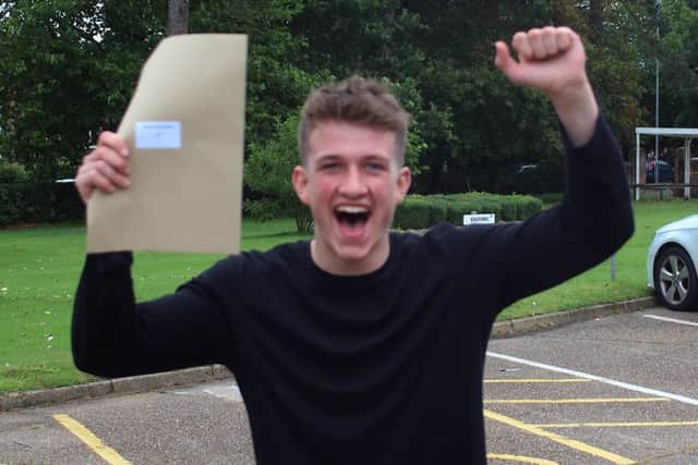 A jubilant sixth-form student at QEHS celebrates after getting the A-level results he wanted.