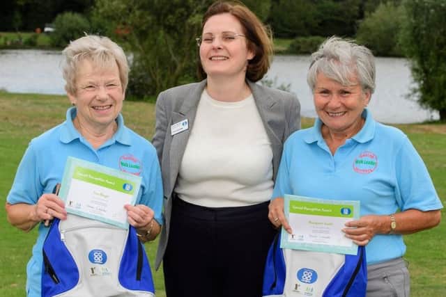Margaret Smith (right) and Sue Wright (left) receive their award from Ursula Lidbetter, of Lincolnshire Co-op. (PHOTO BY: Chris Vaughan Photography).