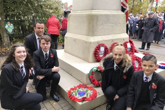 Four Gainsborough Academy students, who took part in the town's Remembrance Sunday service and laid a wreath at the war memorial last year.