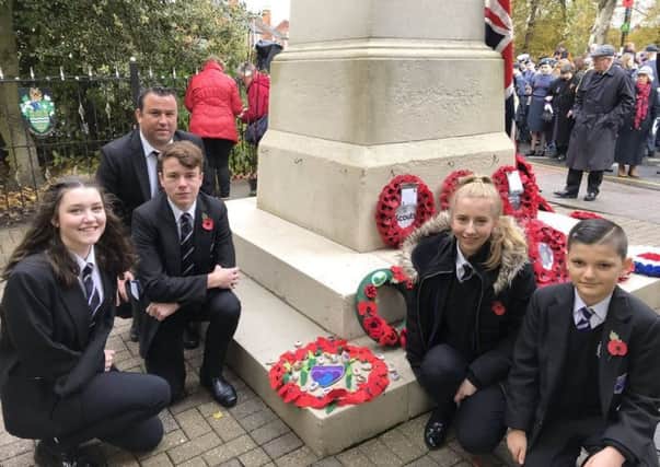 Four Gainsborough Academy students, who took part in the town's Remembrance Sunday service and laid a wreath at the war memorial last year.