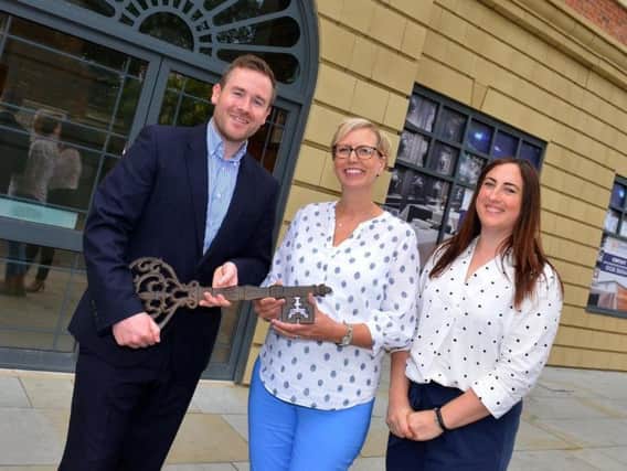 Mette (centre) with Dave Hale and Alison Shipperbottom from Dransfield Properties at a special key handover for the new unit.