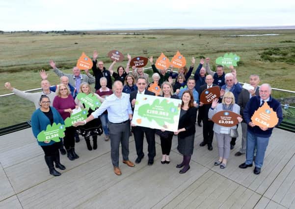 Environmental good causes have been given a share of £159,000 raised through Lincolnshire Co-ops Community Champions scheme.