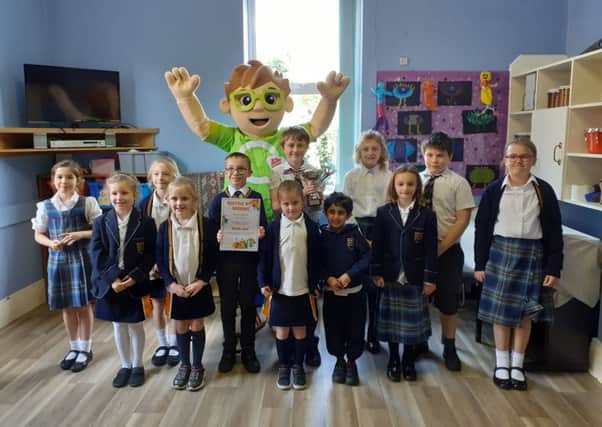 Handel House School pupils are pictured with the Recycle with Michael mascot