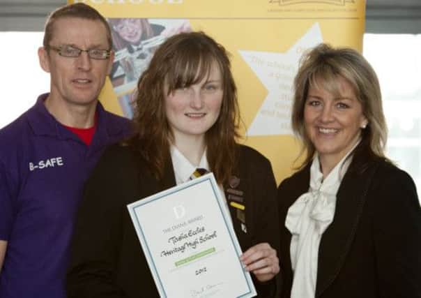 Heritage High School student Tasha Eccles with her Diana Award and deputy headteacher, Susan Dench and District Youth Worker for Clowne Multi Agency, Tony Patterson.