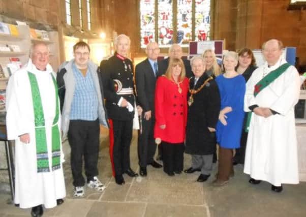 Rotherham councillors with members of the church, the Lord Lieutenant of South Yorkshire and representatives from the National Autistic Society