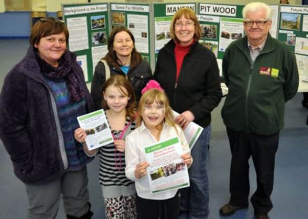 Manton Pit Wood regeneration information event, pictured from left community liason officer for country parks Sue McDonald, Sandra Jenkins, Bethany Talbot, 10, Jazmin Jenkins, seven, Gill Grievson, and Malcolm Funnell of Step2itDukeries (w130211-3b)