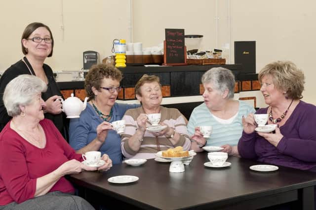 Val's Tearoom has officially opened at The Aurora Wellbeing Centre. Manageress Karen Morris serves tea to clients (l-r); Doreen Smith, Chris Bloomer, Kath Inman,Angela Edson and Trish Wright