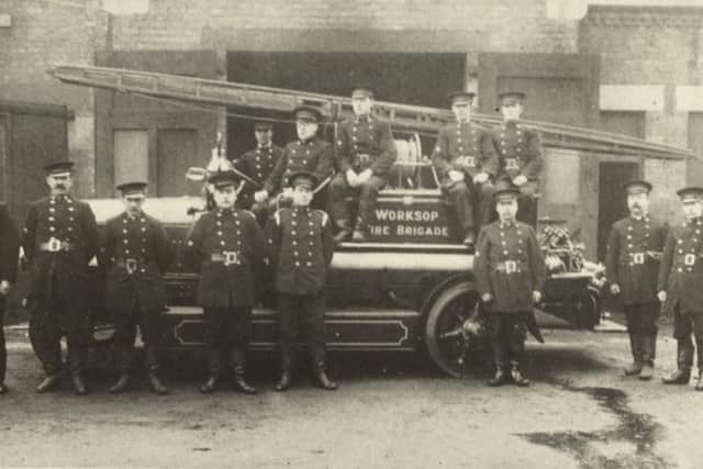 Members of the Fire Brigade pictured with their first motorised fire engine outside the original fire station on Canal Road in 1923.