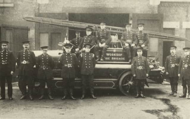 Members of the Fire Brigade pictured with their first motorised fire engine outside the original fire station on Canal Road in 1923.