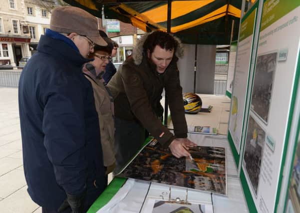 New Worksop bus station plans go on display at the Civic Square in Worksop.  Pictured far right is Ton Boulan, Senior Project officer, Notts County Council.