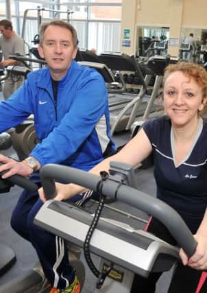 Retford and Worksop leisure centres are to recieve a cash boost to create a new mezzanine floor with brand-new gym equipment, pictured are Peter Clark of Bassetlaw Council with Coun Julie Leigh (w130227-1c)