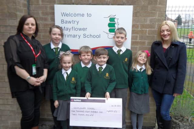 Becky and Adele from the Vanilla Rooms present a cheque to Bawtry Mayflower Primary School