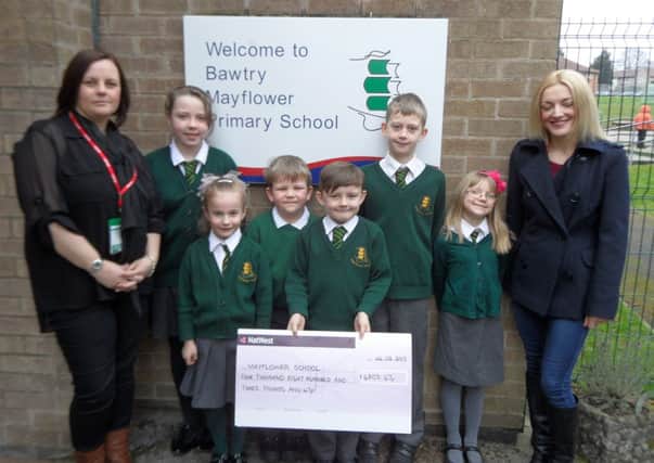 Becky and Adele from the Vanilla Rooms present a cheque to Bawtry Mayflower Primary School