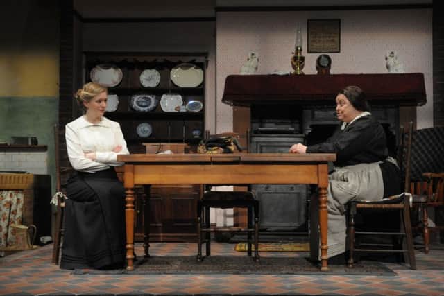 Strife at home . . . Mrs Gascoyne senior (Lynda Baron) has a "'cosy kitchen chat' with the newly wed Mrs Minnie Gascoyne (Claire Price) in a scene from 'The Daughter-in-Law' at Sheffield's Crucible Theatre. (Photo: Robert Gray)
