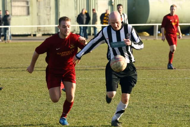 Match action from Retford United's game against Arnold Town