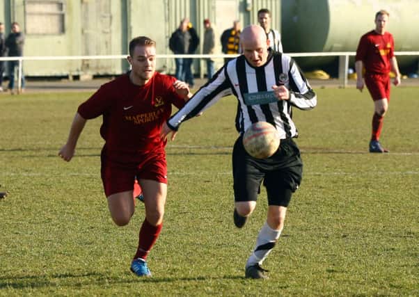 Match action from Retford United's game against Arnold Town