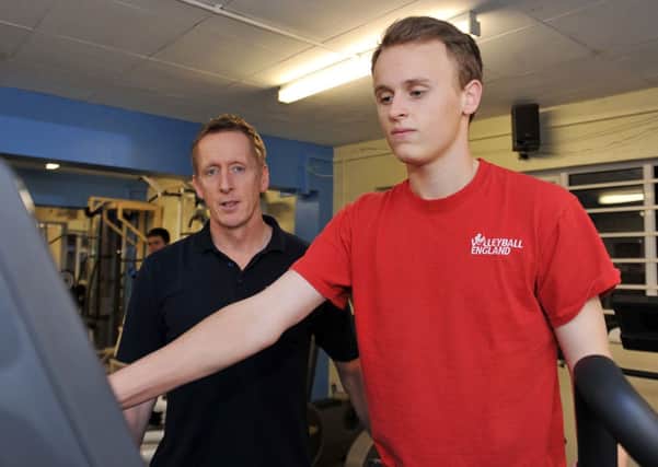 Launch of Apple Elite, training for promising young athletes from the local area.  Pictured with gym manager Steve Chambers is volley ball player Ben Tomlinson, 15 (w121129-3e)