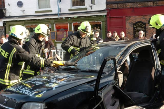 South Yorkshire Fire and Rescue Service conduct a road safety demontration in Doncaster's Sunny Bar. Picture: Liz Mockler D1372LM