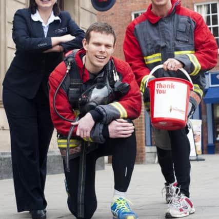 Firefighters Paul Mclafferty and Russell Kay who with the support of Katie Scott Natwest Retford Branch Manager are collecting sponsors to raise funds for The Firefighters Charity as part of team who will be jogging 100K from London to Brighton
4 March 2013
Image © Paul David Drabble