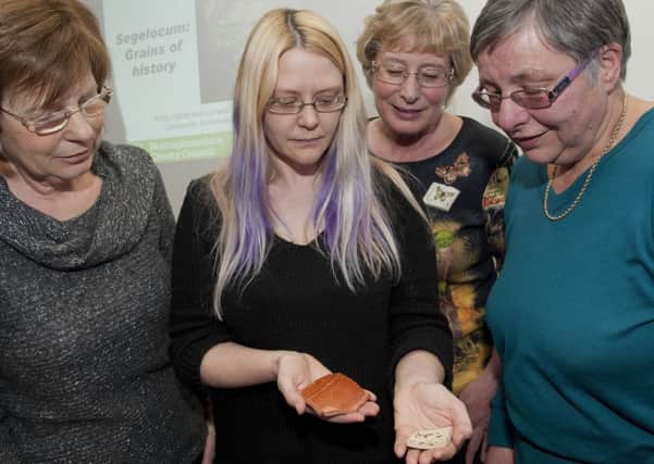 Nottinghamshie Community Archaeologists visited Retford library on Wednesday to give a glimpse of life in the roman era 'Segelocum....Grains of History'. Lorraine Horsley of Nottinghamshire Community Archaeologists with (left to right); Anne Exton, Julie Ratcliffe and Judith Goodall