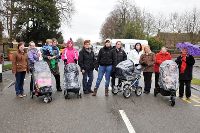 Parents of children attending Tuxford Primary School protest over Notts County Council plans not to employ a lollipop lady when the present one retires shortly, Coun Shirley Isard is pictured far right (w130315-7a)