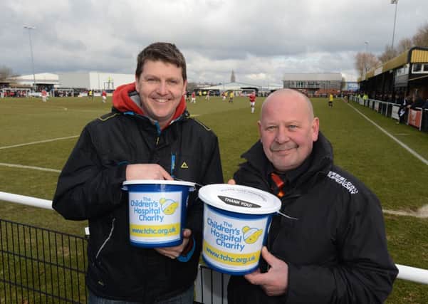 Worksop Town FC in support of the Children's Hospital Charity. Pictured at the Worksop Town v FC United of Manchester match is the Children's Hospital Charity corporate fundraiser Tchad Western and Kev Keep.