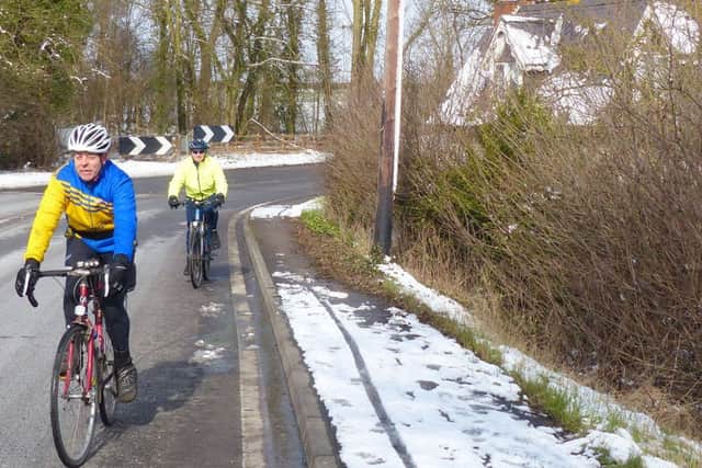 Trevor Halstead and Daniel Nicholson riding through Saundby