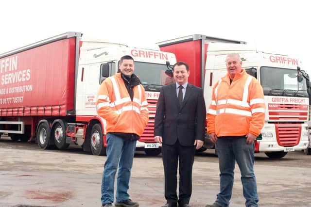 From the left, Griffin Freight Services transport manager Richard Burton, Yorkshire Banks commercial relationship manager Peter Stapleford and Griffin Freight Services managing director Mick Griffin in front of one of the new trucks