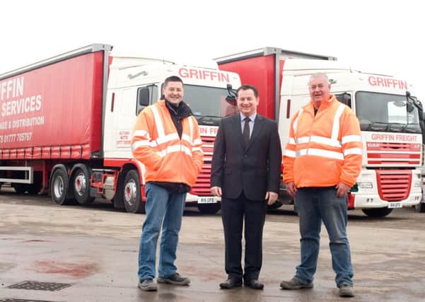 From the left, Griffin Freight Services transport manager Richard Burton, Yorkshire Banks commercial relationship manager Peter Stapleford and Griffin Freight Services managing director Mick Griffin in front of one of the new trucks