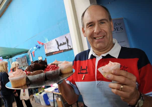 Cake sale in aid of Help for Heroes.  Pictured is Tony Eaton  (w110404-7d)