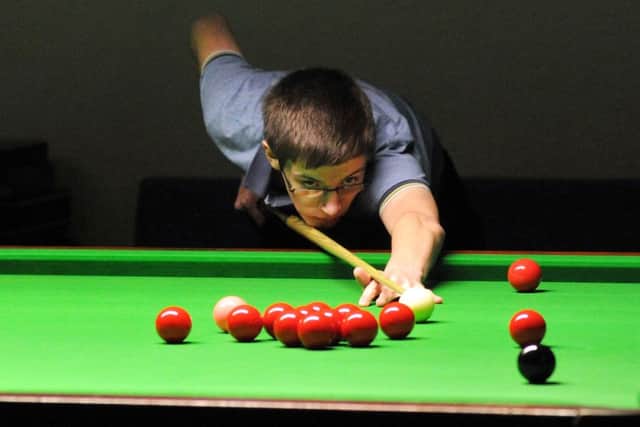 Snooker coach Darren Presgrave and his student Ash Carty play against each other in the Worksop Snooker League's scratch competition final (w120519-7c)