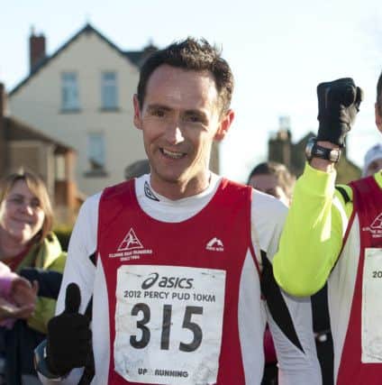 Percy Pud 10km Race 2012. Race winner Andy Ward (centre), second Alan Buckley (right) and third place Gareth Lowe (left)