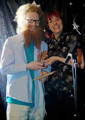Ross Spencer being handed his prizes