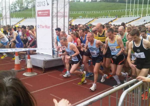 The Sheffield Half Marathon gets underway at Don Valley Stadium.