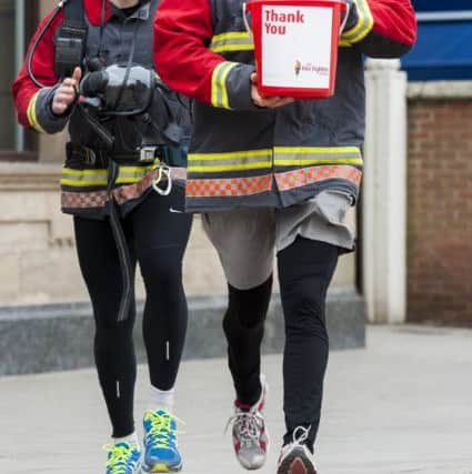 Firefighters Paul Mclafferty and Russell Kay who with the support of Natwest Retford Branch Manager are collecting sponsors to raise funds for The Firefighters Charity as part of team who will be jogging 100K from London to Brighton
4 March 2013
Image © Paul David Drabble