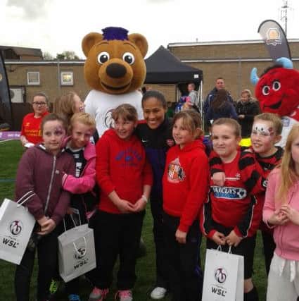 Rachel Yankee with the Parish girls