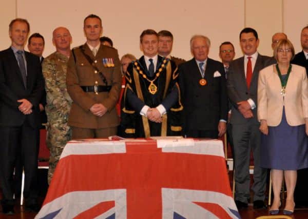 Various organisations including Bassetlaw Council gather to sign the Armed Forces Community Covenant.