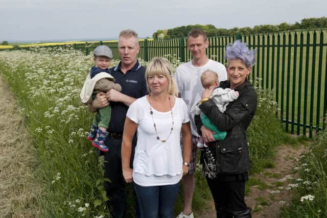 Throapham resident Julieanne Curtis and her neighbours protest against fencing erected around Dinnington Comprehensive School playing fields preventing public access