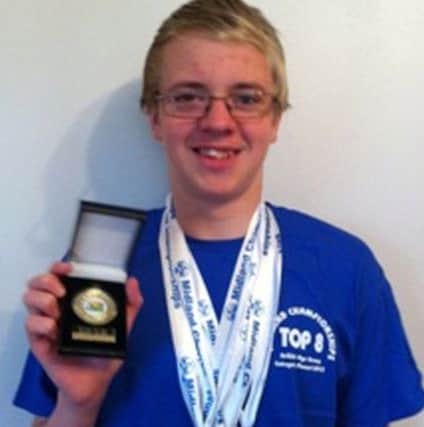 Thomas Atkinson with his medals