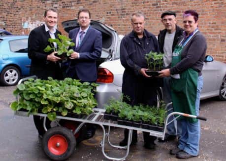 Mike Rysak, project manager at The Walled Garden; Mike Smith, of the Rotherham Rotary Club; together with volunteers and staff Kevin Thompson, Tony Richardson and Kathy Wilson