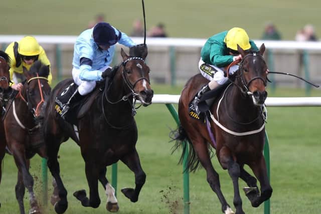 Windhoek (right) ridden by Joe Fanning on the way to winning The 200,000 Tattersalls Millions 3-y-o Trophy from second placed Greatwood (left) ridden by Kieren Fallon during day two of the Craven Meeting at Newmarket Racecourse, Suffolk. PRESS ASSOCIATION Photo. Picture date: Thursday April 18, 2013. Photo credit should read: John Walton/PA Wire