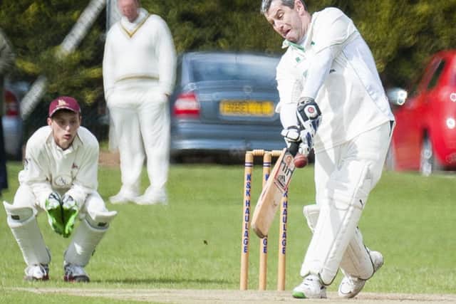 Everton Batsman John Waghorn hits a for from a ball by Lee Stead watched by Marshalls wicket keeper Jamie Flavel during play at Marshalls ground worksop on Saturday afternoon
11 May 2013
Image © Paul David Drabble