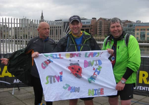John Farrow, Martin Ward and Nigel Burton at the Millennium Bridge Finish in Newcastle