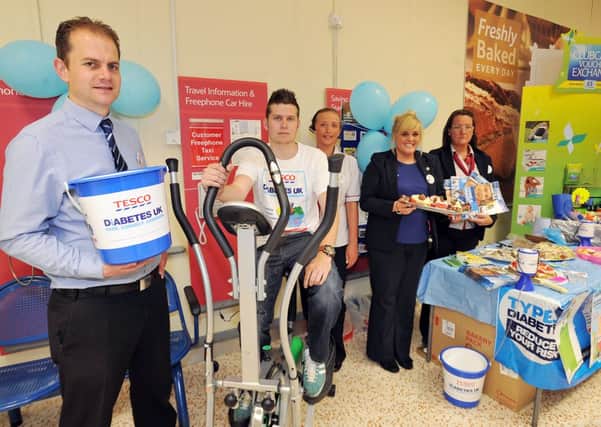 Tesco staff held an awareness day for Diabetes UK, their chosen charity of the year.  Pictured are Martin Wright, James Clavy, Emily Johnson, Rachel Fores and Anne Garbon (w130615-2)