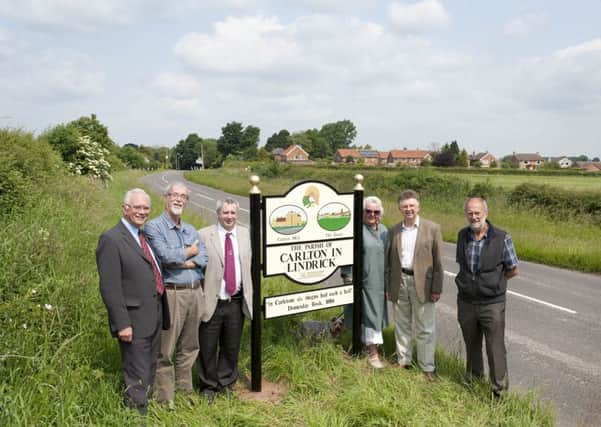 A new village sign for Carlton-In-Lindrick was unveiled by local councillors on Wednesday. (l-r): District and Parish Cllr Barry Bowles; Parish Cllr Ted Banks; Chairman of Environment Committee, Jim Creamer; Parish Cllr Chris Connolly; Leader Notts County Council, Cllr Alan Rhodes and Chairman Carlton Parish Council, Cllr Chris Smith