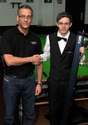 Ash Carty pictured at North Notts Arena with sponsor Neil Sandford of Cuecraft (w130704-4c)