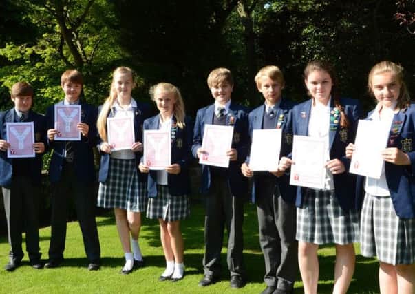 Pupils at Worksop College Prep School are presented with their Young Leaders Award G130625-1b