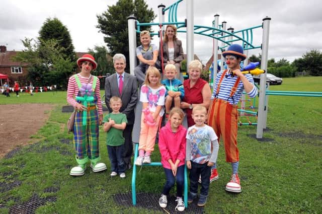 New play equipment has been installed at Beckett Avenue, Carlton.  Bassetlaw Council deputy leader Griff Wynne and Coun Julie Leigh are pictured at the official launch (w130731-3a)