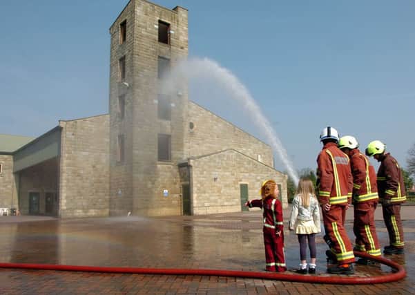 Abbie Gardner, five and Macie-Jo Lloyd, five, won a competition to have a tour round Aston Park Fire Station w110420-13f